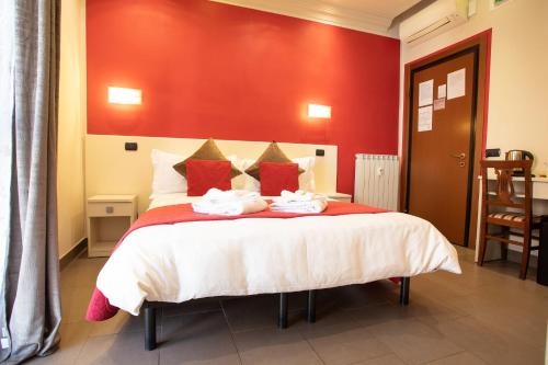 Кровать или кровати в номере Il Piccolo Piacenza
