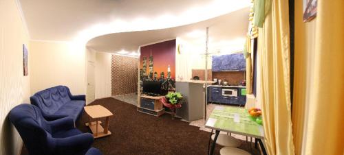 Η κουζίνα ή μικρή κουζίνα στο Apartment Dekabristov 23a