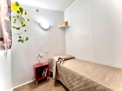 Letto o letti in una camera di Camping Village Tuscia Tirrenica