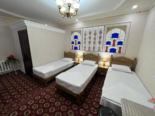 Ένα ή περισσότερα κρεβάτια σε δωμάτιο στο ''NAVO'' Boutique