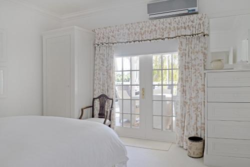 Katil atau katil-katil dalam bilik di Farm Lorraine Lake Cottage, Loft Cottage and Garden Cottage