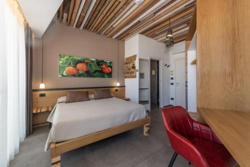 Postel nebo postele na pokoji v ubytování Hotel Da Romano