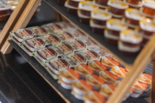 a display case with a bunch of sushi at Boardinghouse HOME - adults only - in Konstanz
