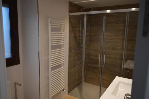 a bathroom with a shower and a sink at Mas Piua in Girona