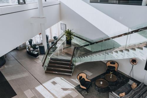 an overhead view of a lobby with a staircase at Courtyard by Marriott Stockholm Kungsholmen in Stockholm