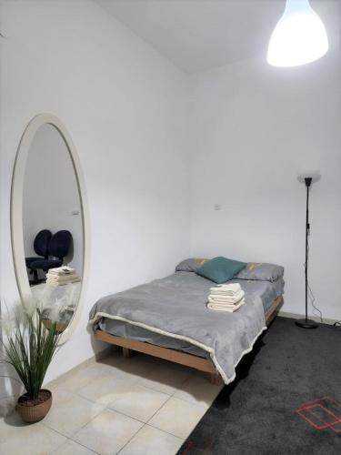 Postel nebo postele na pokoji v ubytování Apartments Nordau