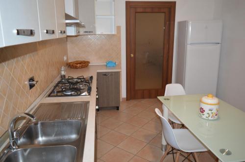 Η κουζίνα ή μικρή κουζίνα στο Residence Epizephyri
