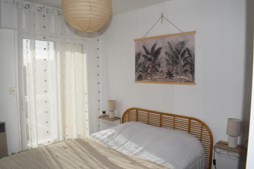 Posteľ alebo postele v izbe v ubytovaní Côte et Vie - appartement et garage