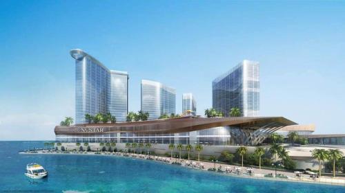 a rendering of a casino with a boat in the water at CasaMia Studio Sanremo Oasis Cebu in Talisay