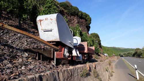 a pile of junk on a hill next to a road at Ferienhaus Würzgarten in Ürzig