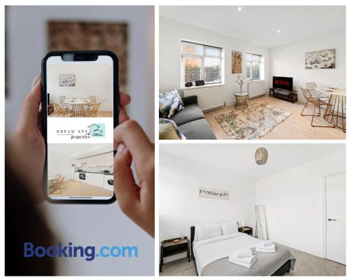 a person taking a picture of a living room at Spacious Two Bedroom Apartment by Dream Key Properties Short Lets & Long Lets Uxbridge- 1 in Uxbridge