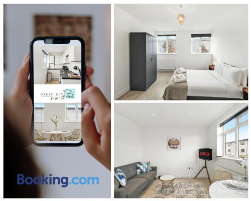 a person taking a picture of a living room and a bedroom at One Bedroom Apartment by Dream Key Properties Short Lets & Long Lets Uxbridge with Free Wi-fi - 5 in Uxbridge