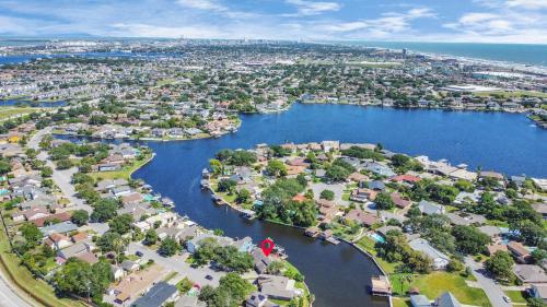 an aerial view of a city with a river at Madeline Lake Oasis Home in Galveston On the Water! in Galveston