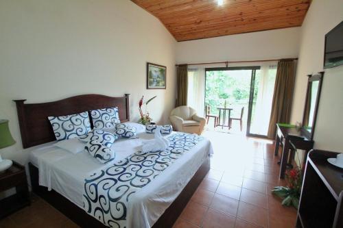 Postel nebo postele na pokoji v ubytování Hotel Monte Real