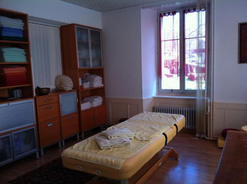 Postel nebo postele na pokoji v ubytování Chambres d'hôtes Chez Epicure
