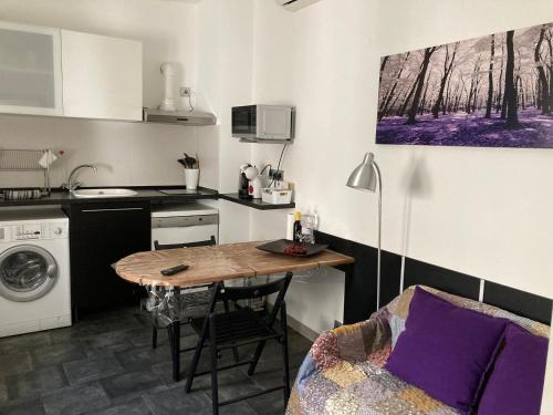 Kuchyňa alebo kuchynka v ubytovaní ASV Apartments