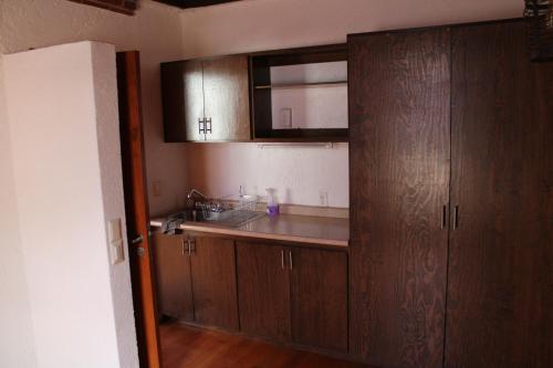 Η κουζίνα ή μικρή κουζίνα στο Casa Frida Coyoacan