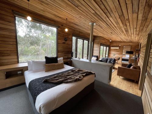 Postel nebo postele na pokoji v ubytování DULC Cabins