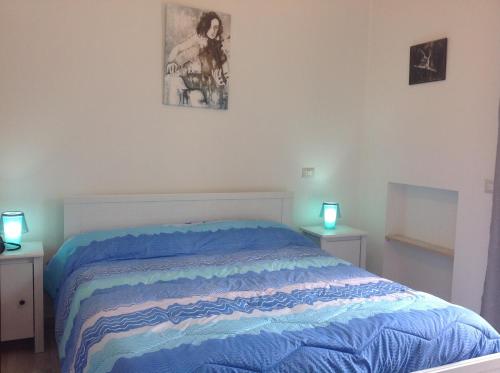 Postel nebo postele na pokoji v ubytování B&B Preludio