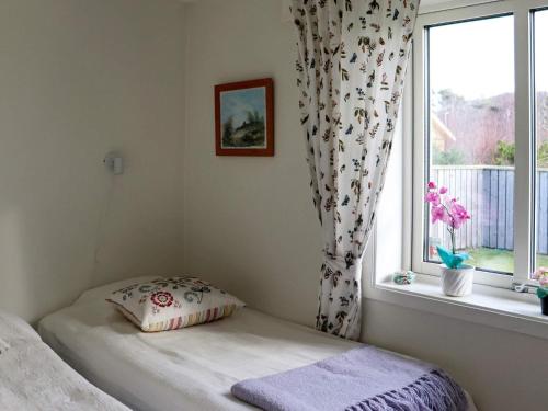 Katil atau katil-katil dalam bilik di 8 person holiday home in MELLBYSTRAND-By Traum