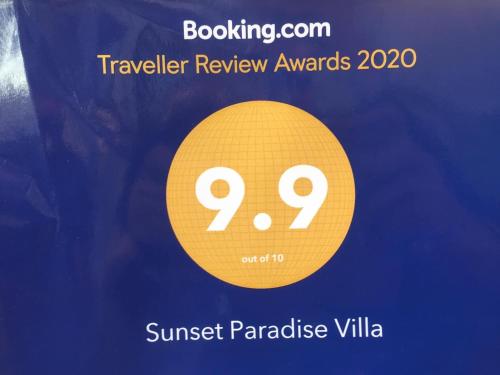 a yellow circle with the words travelreliever review awards at Sunset Paradise Villa in Haad Pleayleam