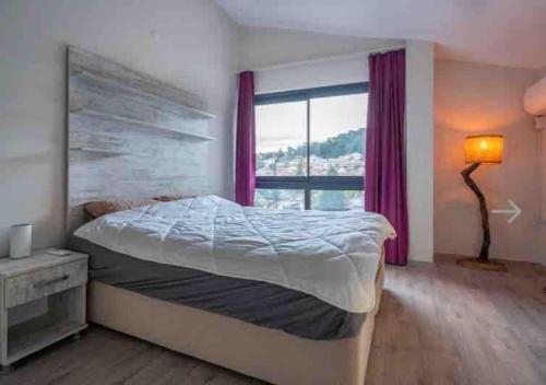 Кровать или кровати в номере Tatilde Villam Marmaris