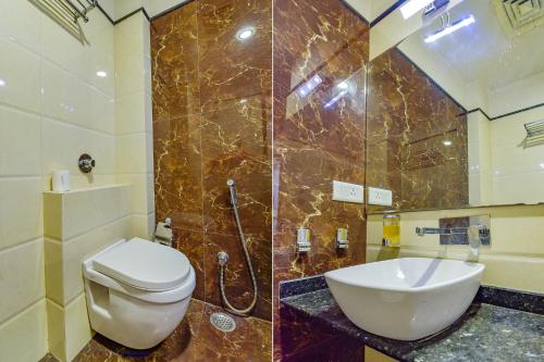 Koupelna v ubytování FabHotel Resolute Gopalpura