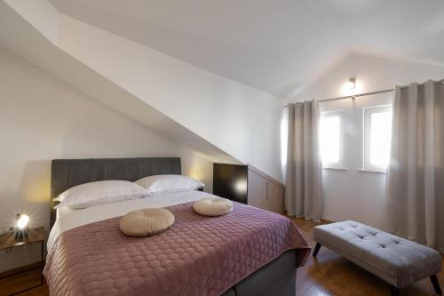 Postel nebo postele na pokoji v ubytování PENTHOUSE J&A