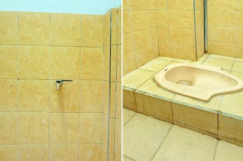 Kúpeľňa v ubytovaní SPOT ON 92400 Dhaha Penginapan House Syariah