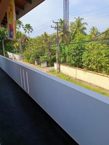 a view from the side of a train at Apartmán Sudu Nangy in Beruwala