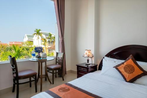 Ένα ή περισσότερα κρεβάτια σε δωμάτιο στο Sam Sam Homestay
