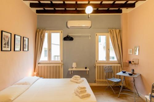 A bed or beds in a room at Cute and charming suite