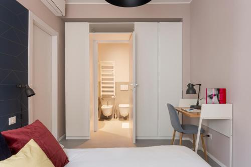 A bed or beds in a room at bilocale Aleardi