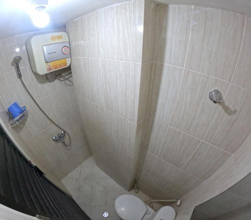 Ett badrum på We Stay Apartemen at Babarsari A3-17