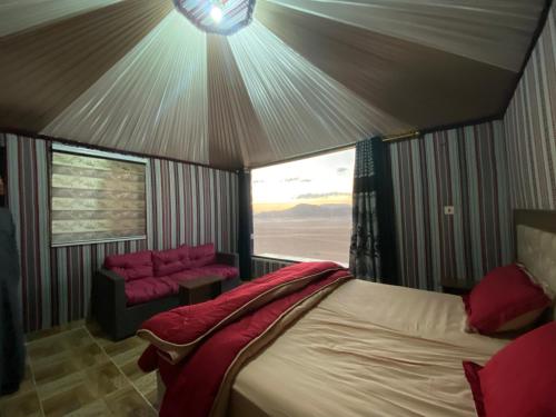 Ein Bett oder Betten in einem Zimmer der Unterkunft Katrina Rum camp