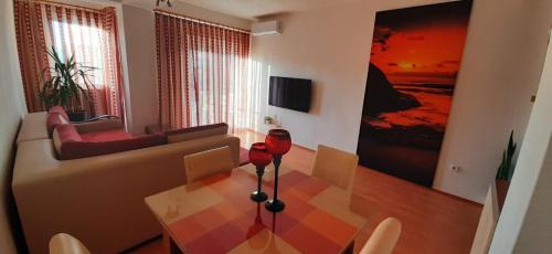 Mila Apartments tesisinde bir televizyon ve/veya eğlence merkezi