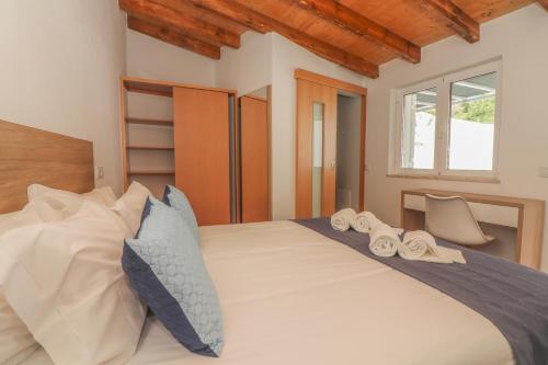 Katil atau katil-katil dalam bilik di Little Break Guest House