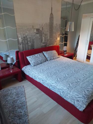 Poço PartidoにあるCasa Alexandraのベッドルーム1室(赤いベッド1台付)が備わります。