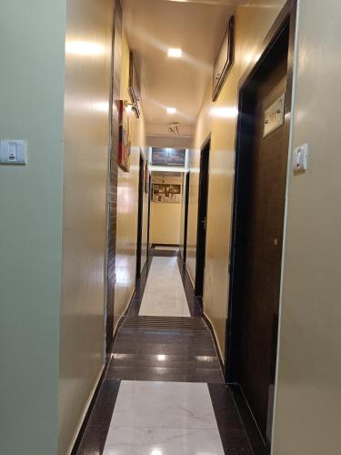 a hallway of a elevator in a building at Hotel Amber-colaba in Mumbai