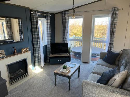 A seating area at Darwin Lodge with Hot Tub