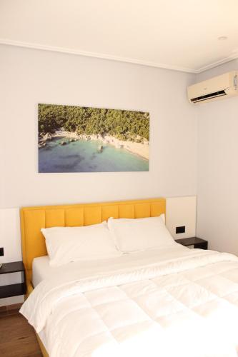 Postel nebo postele na pokoji v ubytování Bebi Hotel And Apartments