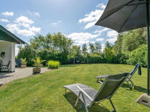A garden outside Holiday Home Suni - 400m from the sea in Funen by Interhome