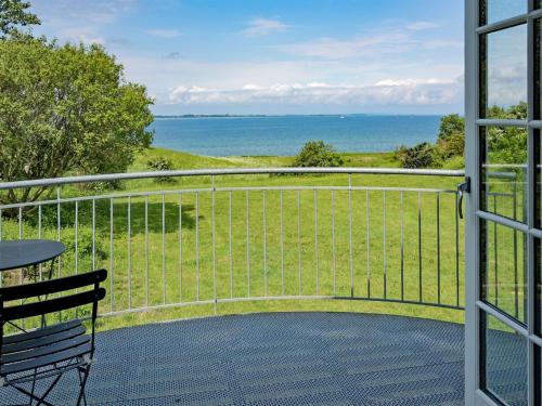 balcone con vista sull'oceano di Holiday Home Ansbert - 150m from the sea in Funen by Interhome ad Assens