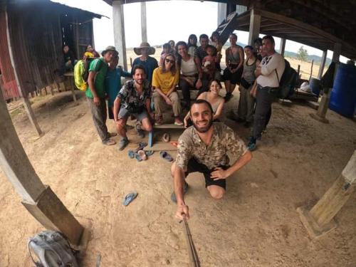 a group of people are posing for a picture at Jar rai village homestay& Sona trekking tour in Banlung