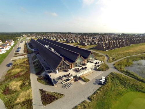 an aerial view of a large house with a large roof at Apartment Dilruba - 2-4km from the sea in Western Jutland by Interhome in Havneby