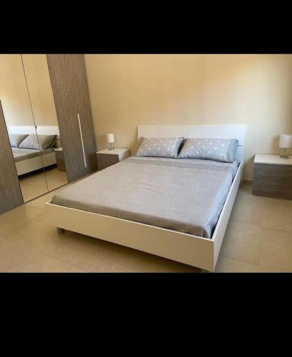 Ένα ή περισσότερα κρεβάτια σε δωμάτιο στο CASA MURALIA