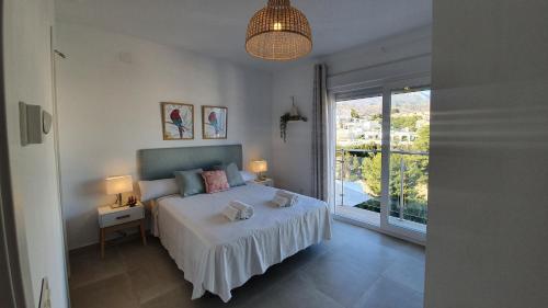 Posteľ alebo postele v izbe v ubytovaní Nerja Paradise Rentals - Villa Encanto