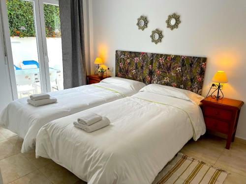 Posteľ alebo postele v izbe v ubytovaní Nerja Paradise Rentals - Villa Jade