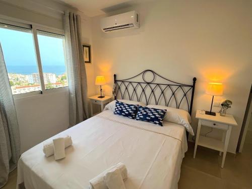 Postel nebo postele na pokoji v ubytování Nerja Paradise Rentals - Morasol Apt 7