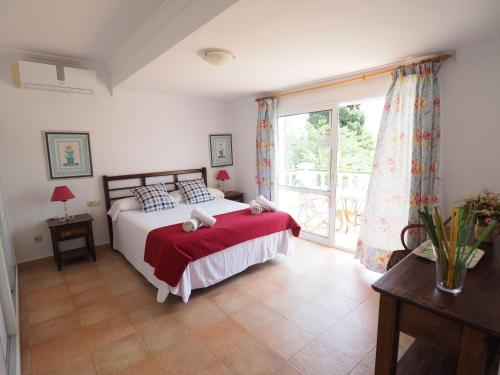 Un pat sau paturi într-o cameră la Nerja Paradise Rentals - Villa Los Leones